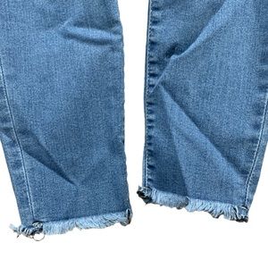 Celebrity Pink distressed-bottom skinny jeans